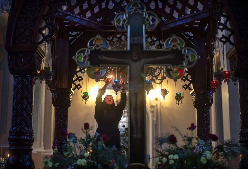 APTOPIX Virus Outbreak Lithuania Orthodox Christmas